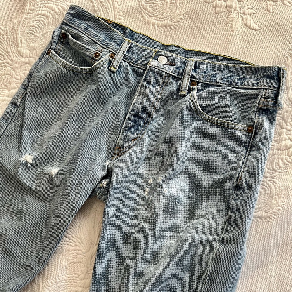 Levi’s 511 distressed straight leg light wash denim jeans size 32 x 32
